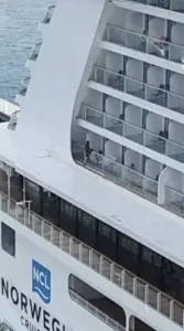 Chasing Clout Over the Sea: Norwegian Getaway Passenger’s Dangerous Stunt Sparks Outrage and Highlights the Perils of Social Media Stunts