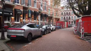 Clash of the Autonomous Titans: XPENG L03 (VLA 2.0) vs. Tesla Model 3 (FSD) in the Crucibles of Amsterdam