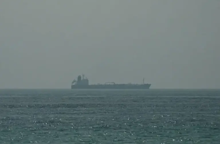 Escalation in the Strait of Hormuz: U.S.-Contracted Vessel Carrying American Personnel Struck in Iranian Drone and Missile Attack