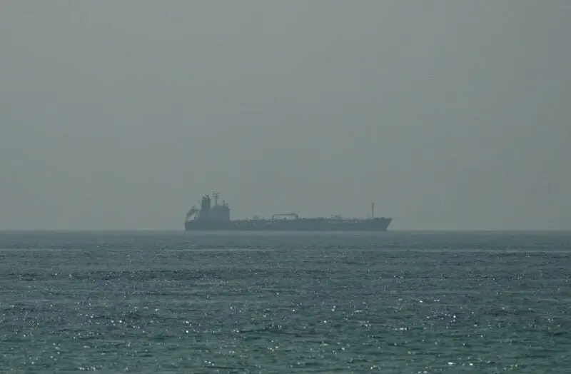 Escalation in the Strait of Hormuz: U.S.-Contracted Vessel Carrying American Personnel Struck in Iranian Drone and Missile Attack