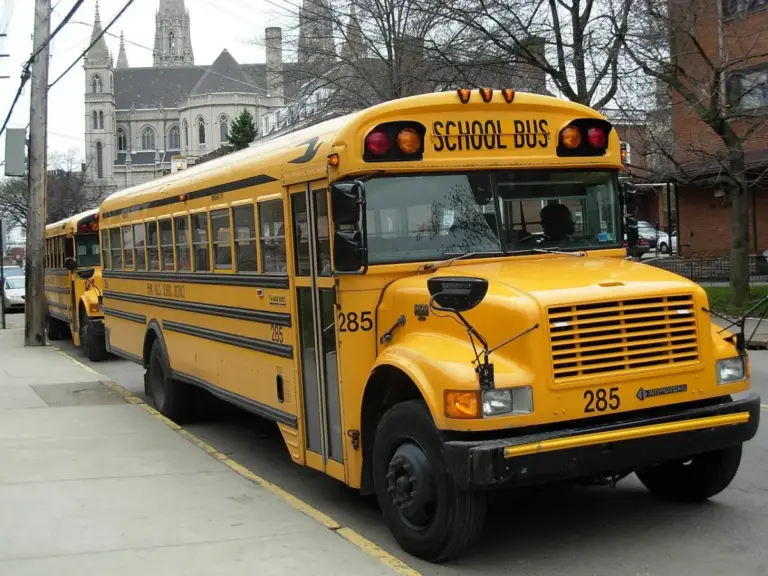 The Great School Siting Blind Spot: Why Districts Hesitate on Electric Buses While Continuing to Build Car-Dependent Campuses